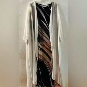 A two piece set, dress and light weight cover.